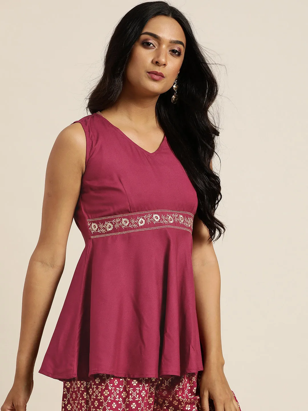 Women Burgundy Embroidered Liva Peplum Top