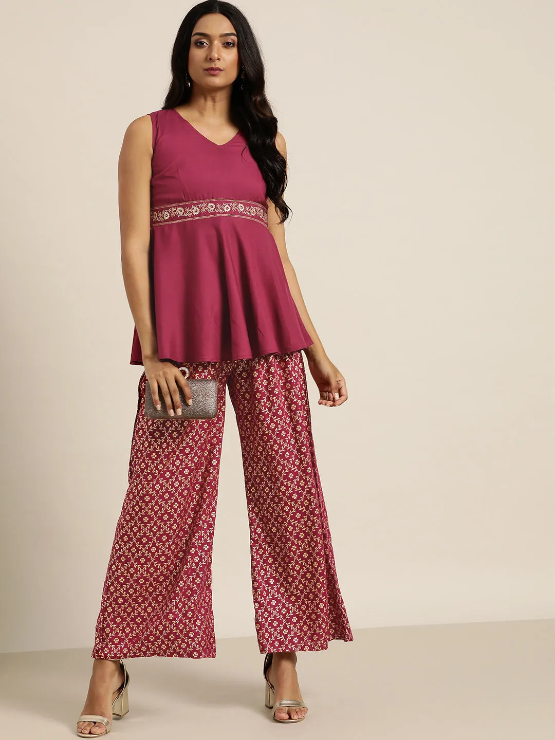 Women Burgundy Embroidered Liva Peplum Top