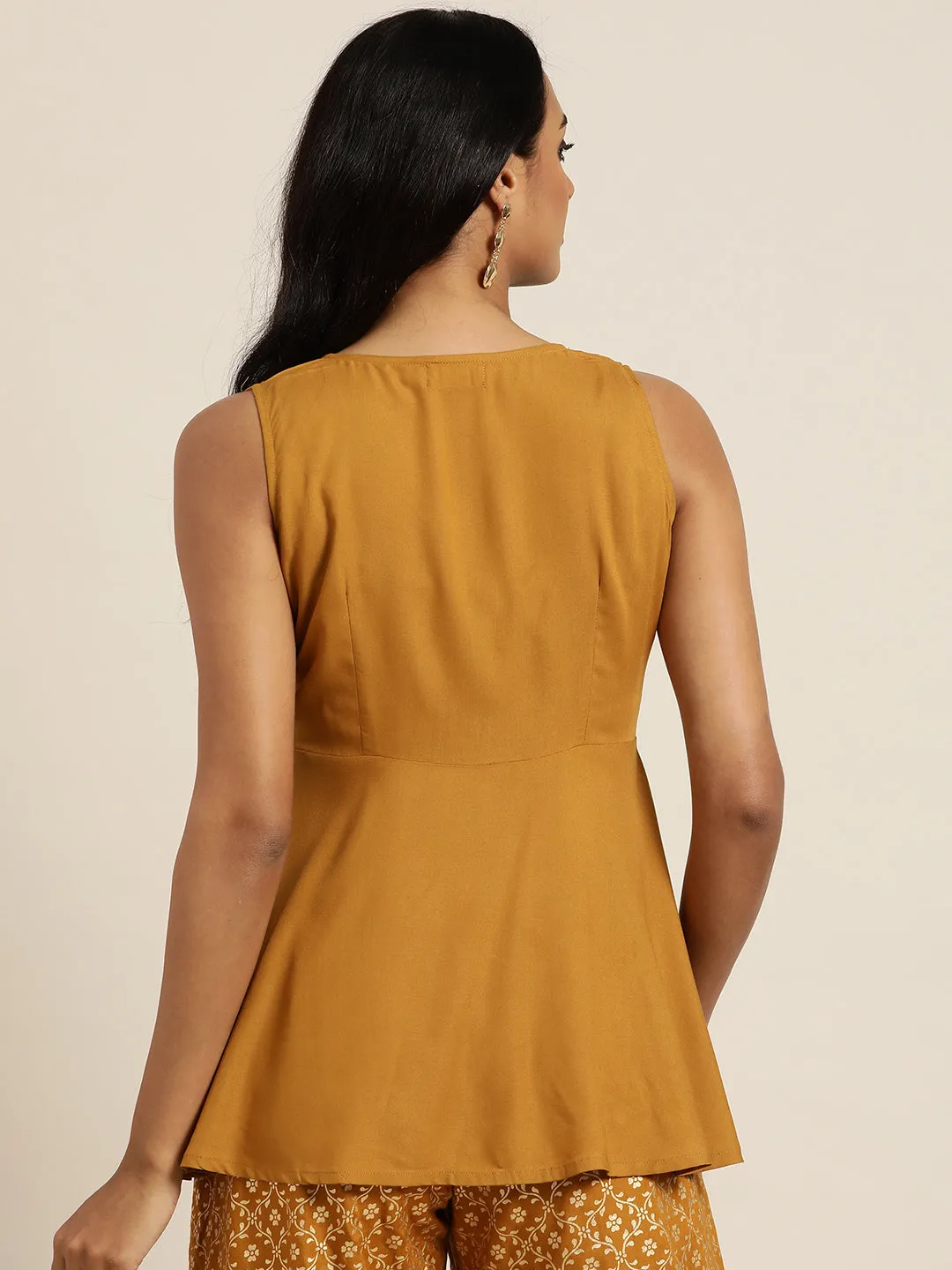 Women Mustard Embroidered Liva Peplum Top