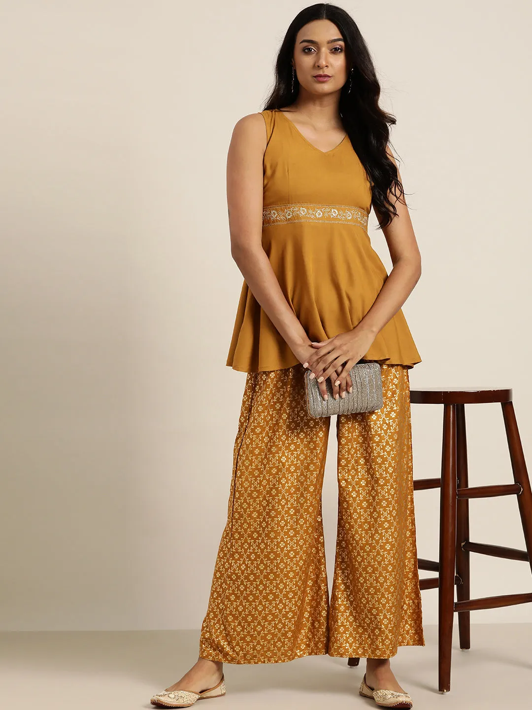 Women Mustard Embroidered Liva Peplum Top