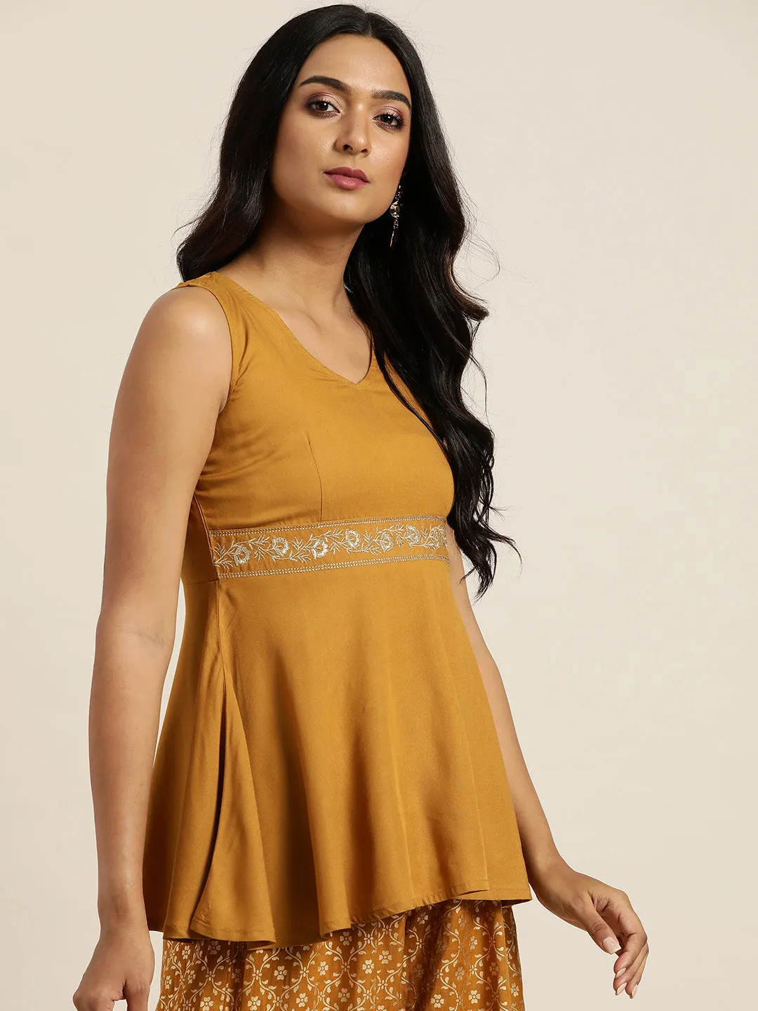 Women Mustard Embroidered Liva Peplum Top